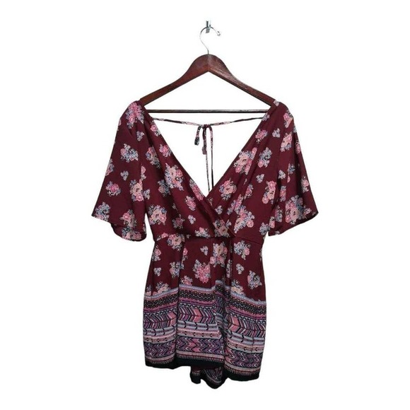 This adorable romper is by Trixxi. Red short sleeve. Size Medium - Picture 1 of 4